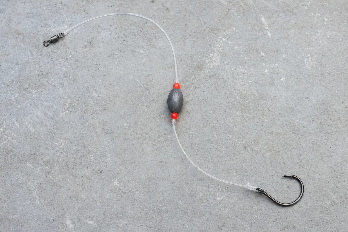 Single-hook Gulf rig with barrel swivel, egg sinker, red beads, and circle hook